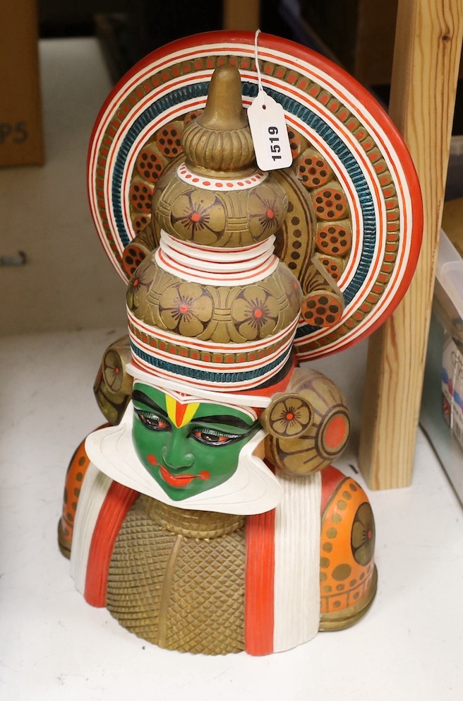 A painted deity, 50 cms high.